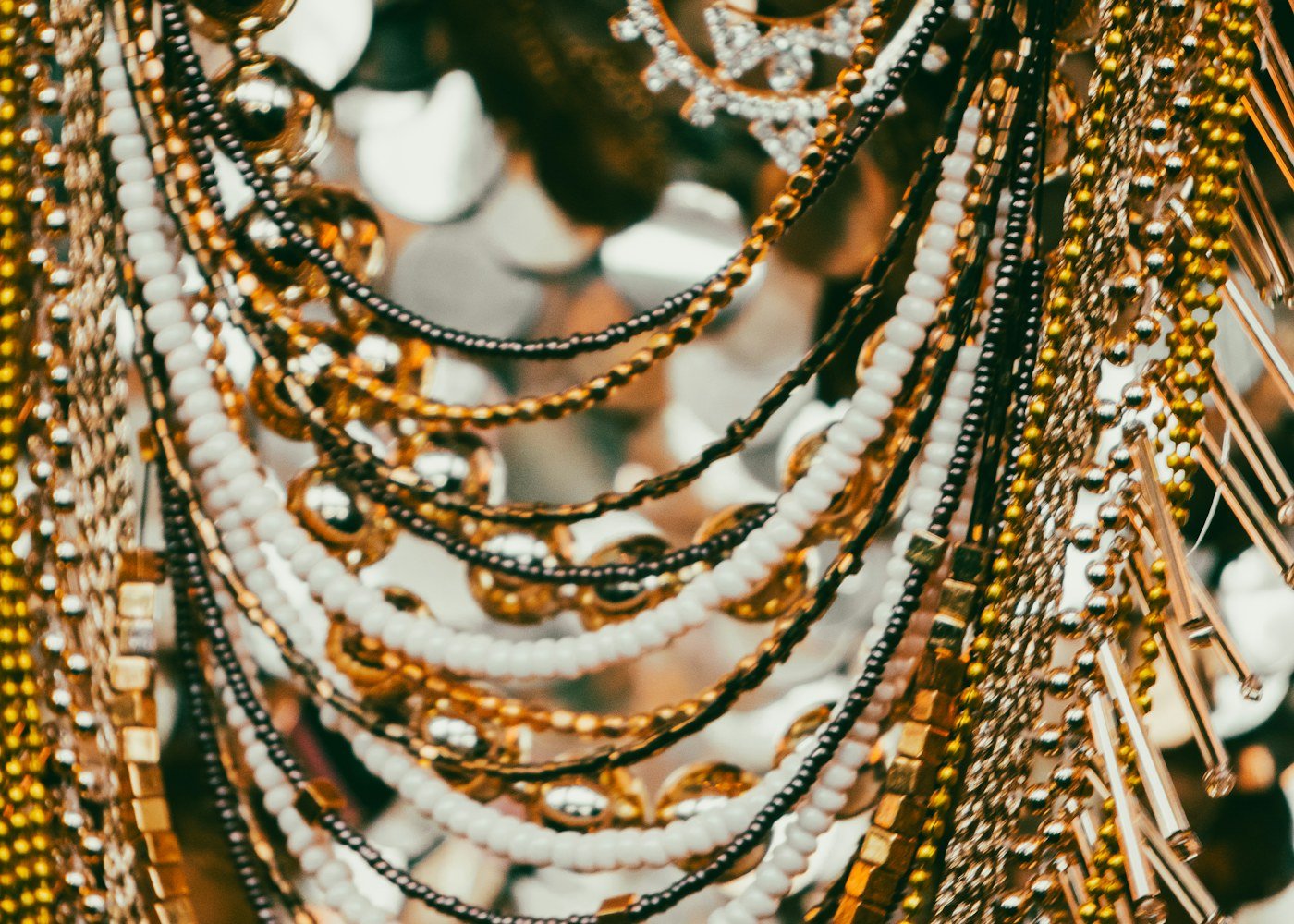 Layered gold and pearl necklaces