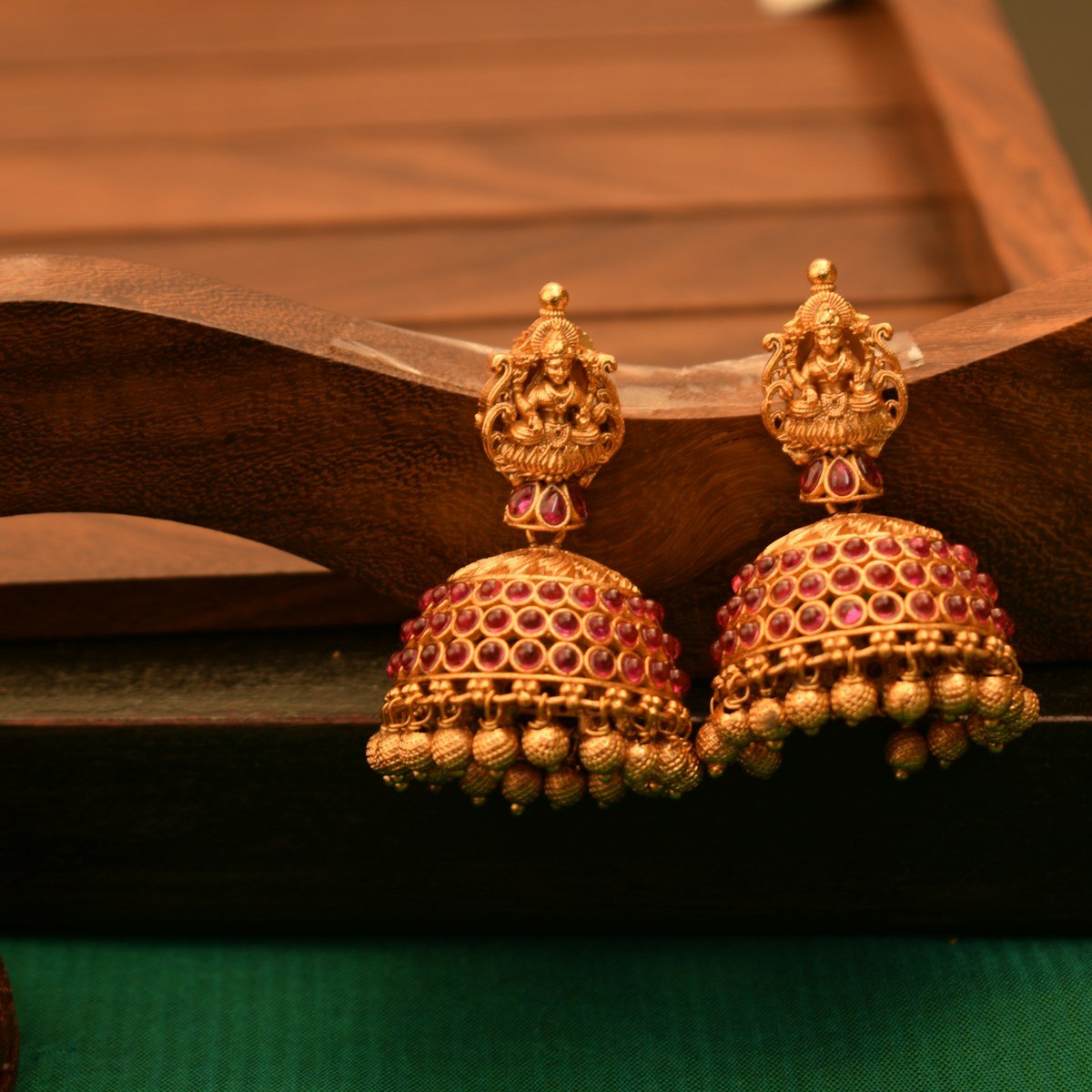 Red and gold jhumka earrings